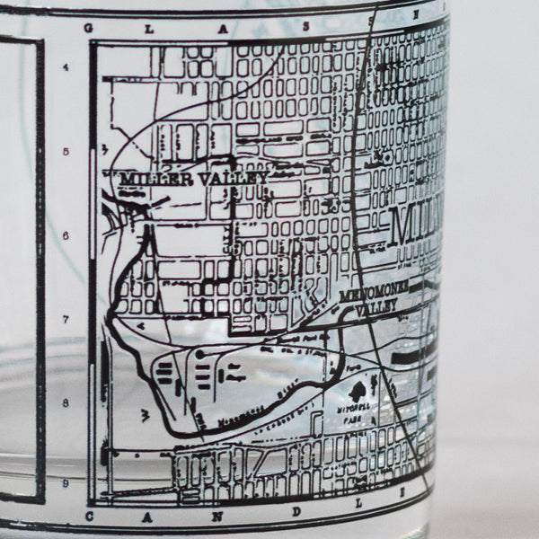 11oz whiskey rocks glass with a screen printed vintage map of Milwaukee. A Milwaukee Candle Co. and Glassnote Candle Bar collaboration. Side 4 close up.