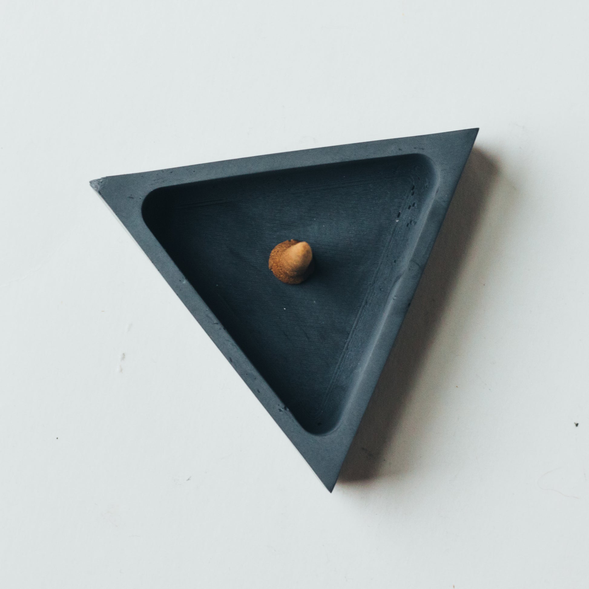 ZOUZ natural incense triangle shaped graphite concrete incense cone burner. Top View.