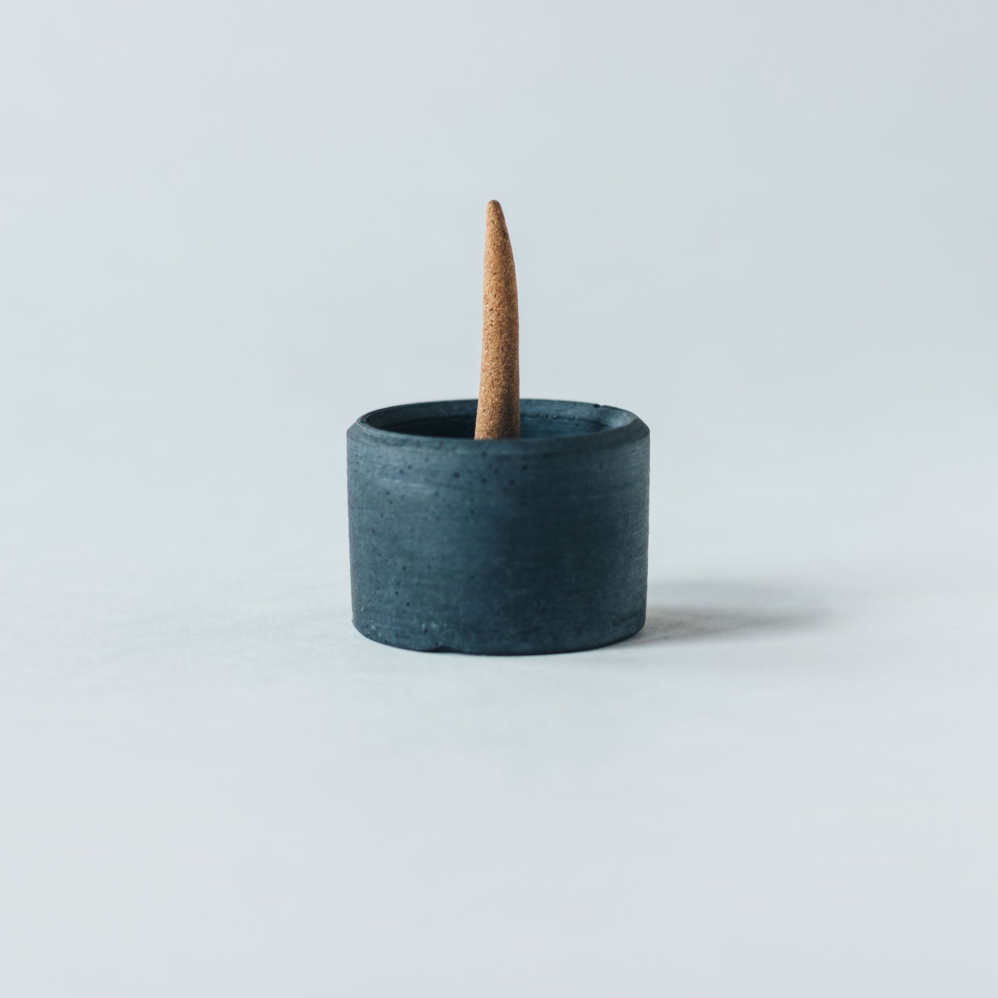 ZOUZ natural incense cup shaped concrete incense cone burner.