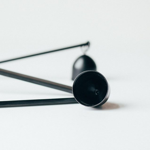 Black candle snuffers.