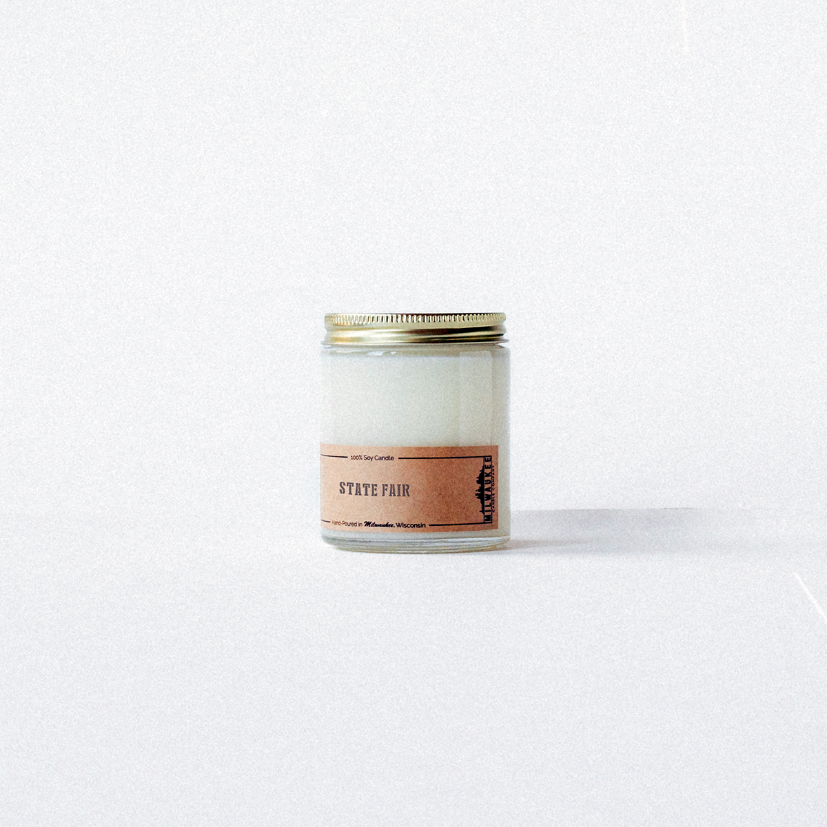 State Fair candle with sweet cinnamon, sugar, and vanilla notes, inspired by Milwaukee’s State Fairgrounds.