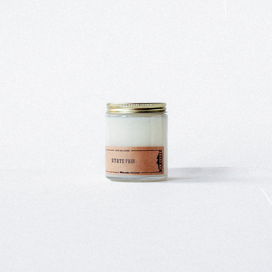 State Fair candle with sweet cinnamon, sugar, and vanilla notes, inspired by Milwaukee’s State Fairgrounds.