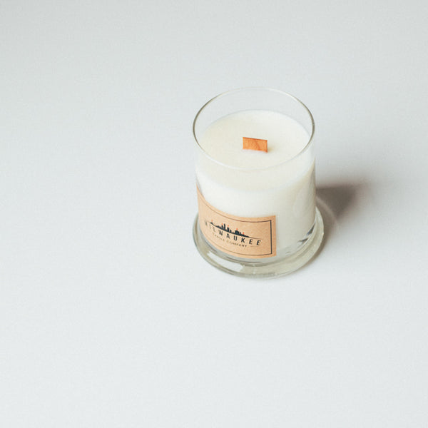 Top view of 12 ounce wood wick soy wax candle with no lid.