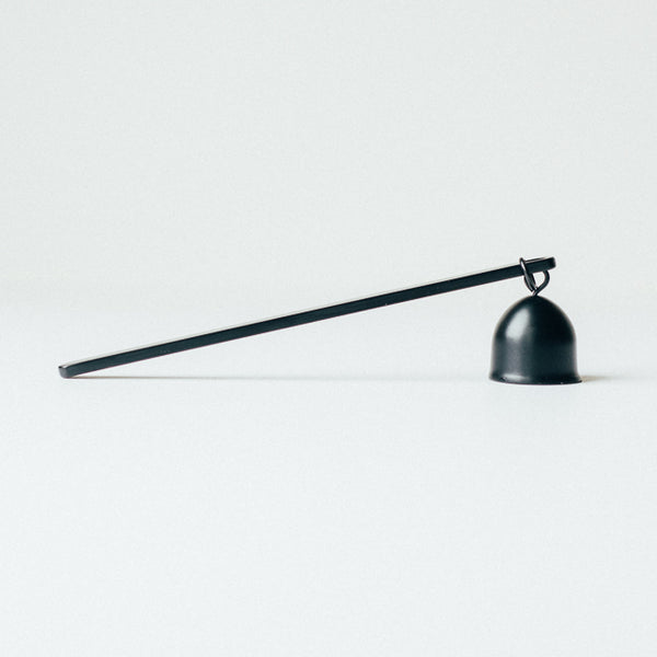 Black candle snuffer.